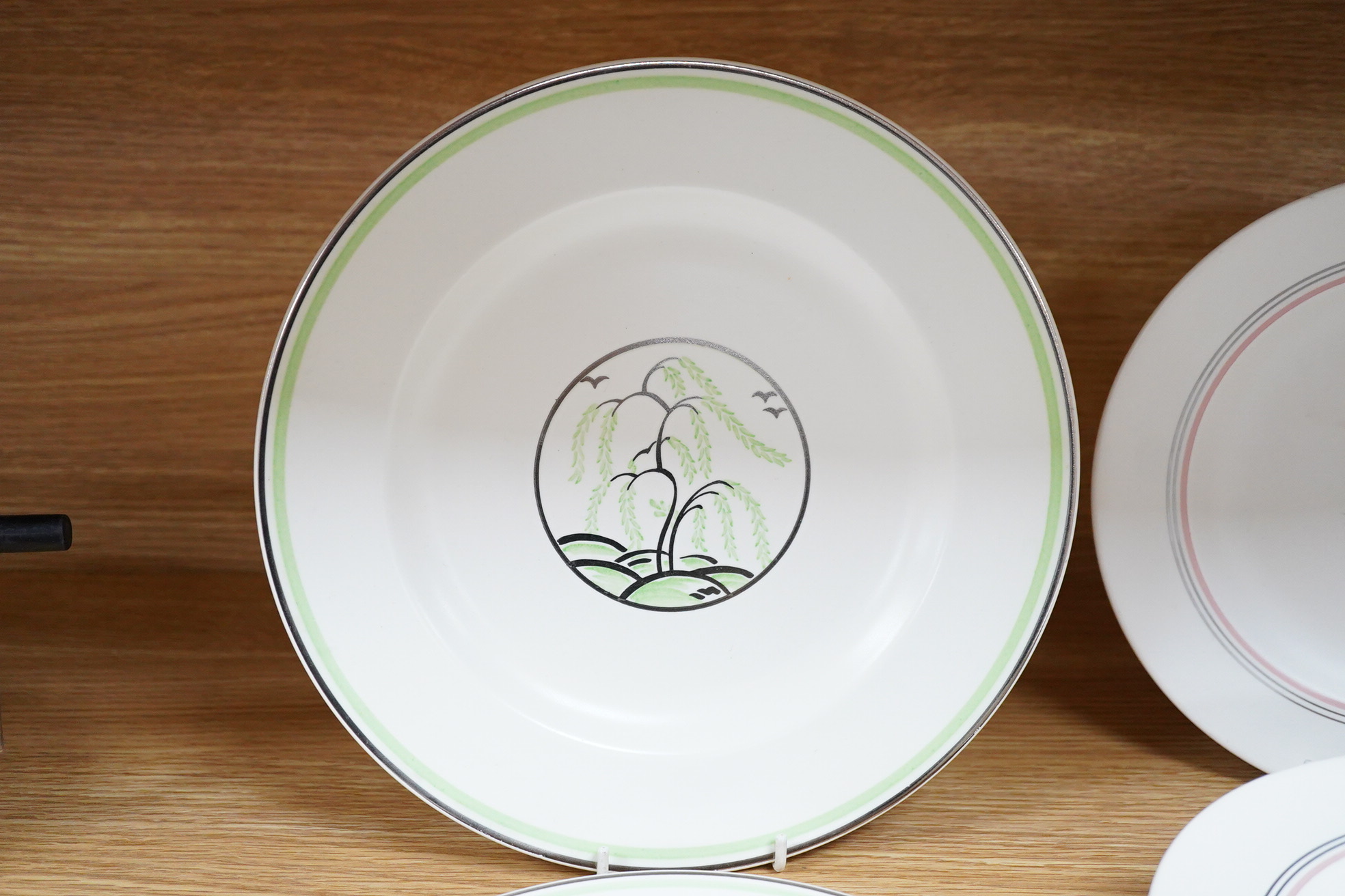 Keith Murray for Wedgwood, moonstone weeping willow, two plates and eight similar examples, largest 26cm in diameter